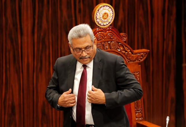 Sri Lankan President Gotabaya Rajapaksa leaves after addressing the parliament during the ceremonial inauguration of the session, in Colombo, Sri Lanka, Friday, Jan. 3, 2020. (AP Photo/Eranga Jayawardena)